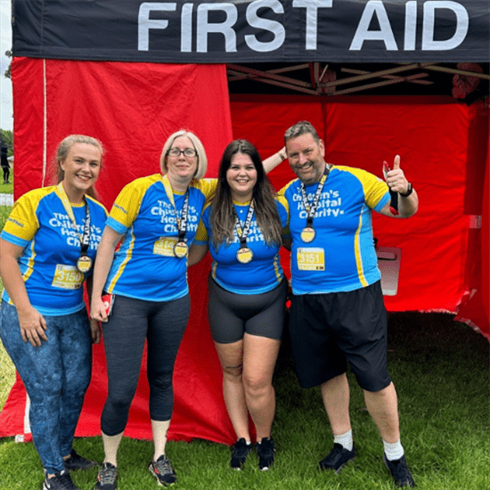 Blake UK Team at Inflatable 5K Outside First Aid